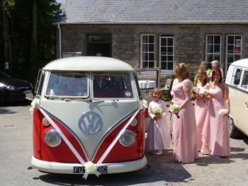 vw camper with bridesmaids
