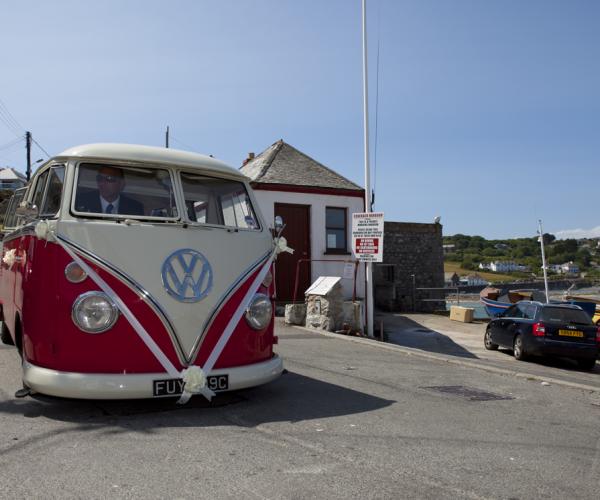 Romeo stunning red and white splitscreen VW for weddings